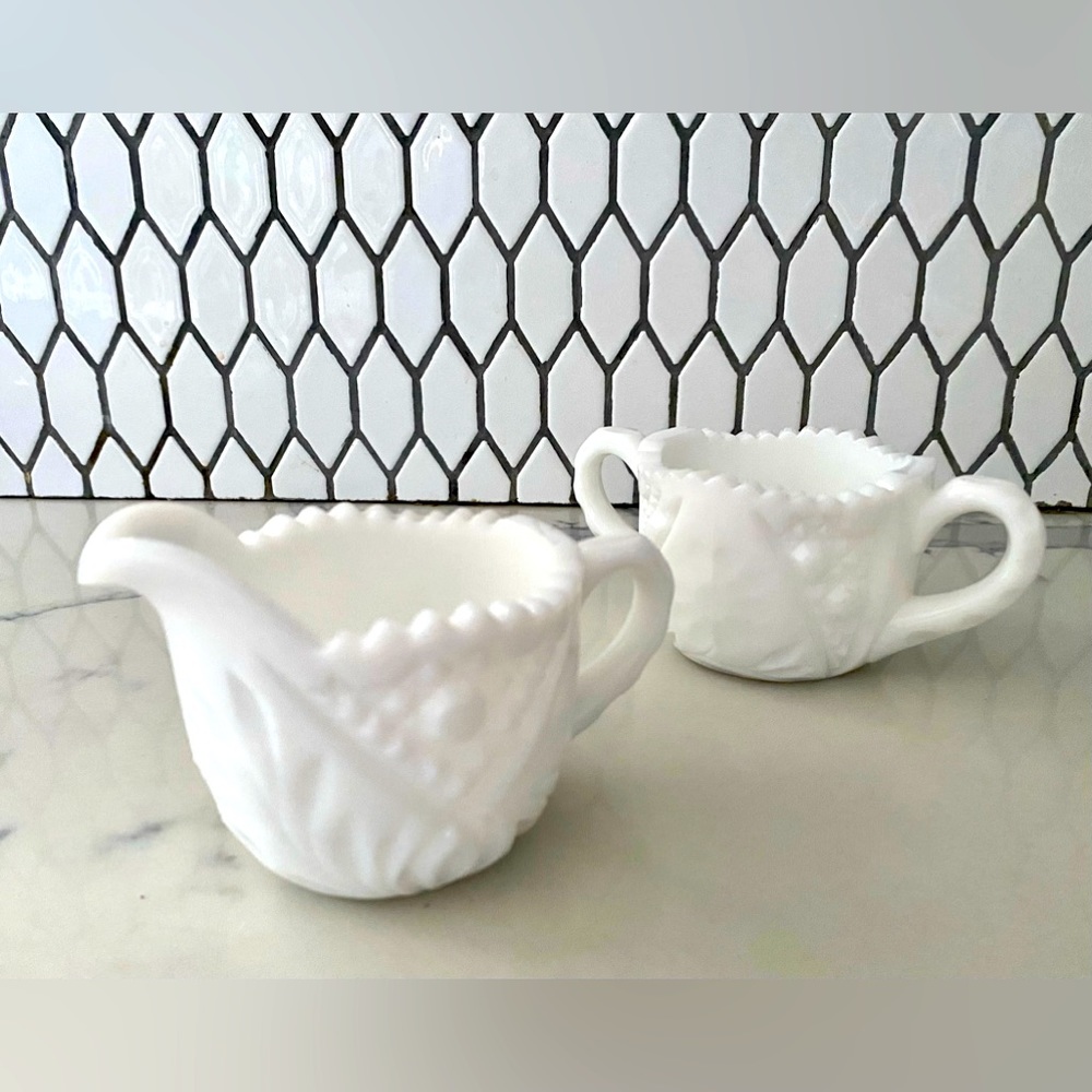 VINTAGE MILK GLASS | cream and sugar excellent condition.Unique faceted design.